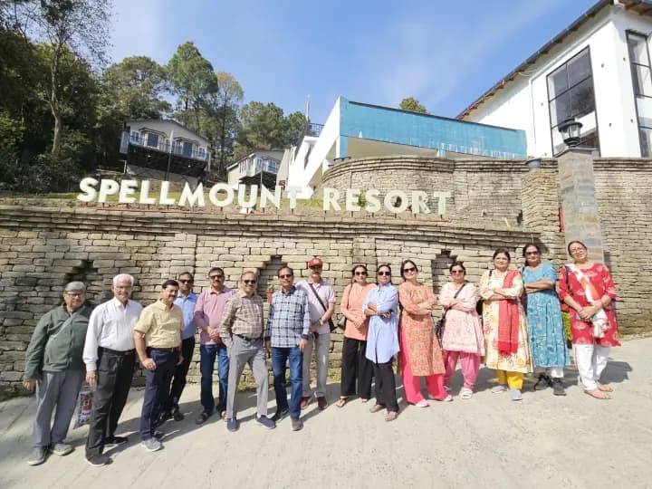 Senior pilgrim group assembled comfortably at Spellmount Resort mountain lodge